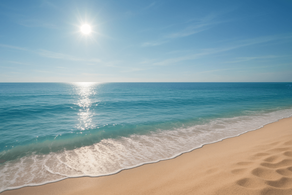 Why is sand hot at the beach and water cold?